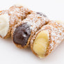 mini cannoli that fill the big cannolo shell